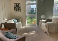 Bright, modern counselling room with seating and natural light in Bracken