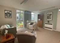 Bright, modern counselling room with seating and natural light in Bracken