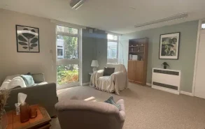 Bright, modern counselling room with seating and natural light in Bracken